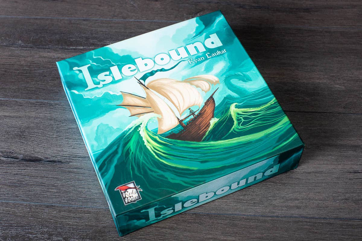 Islebound Emerald Edition, Islebound board game, Red Raven Games Islebound, World of Arzium board game, Ryan Laukat game, sea faring strategy board game, nautical fantasy board game, archipelago board game, pirates and sea monsters board game, trade build invade board game, island town strategy game, capital city building board game, crew hiring board game, emerald resource board game, revised building deck Emerald Edition, 2 to 4 player strategy game, 30 minute strategy board game, fantasy adventure strate