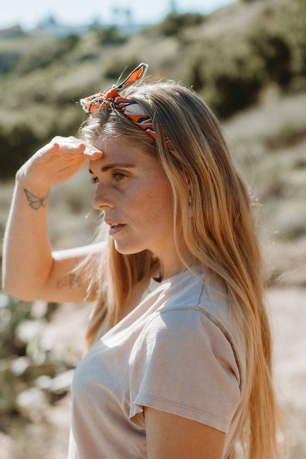 The Desert Sun Bandana by Bandits Bandanas features original artwork by Michael Matheson (Metal Teepee) and is made from Fair Trade Certified, 100% organic cotton. Soft, breathable, and versatile, this 21" × 21" bandana is perfect for hair, neck, or bag styling. Each purchase gives back, with 10% of proceeds supporting the International Rescue Committee, making it a meaningful, artist-driven accessory designed to be lived in.