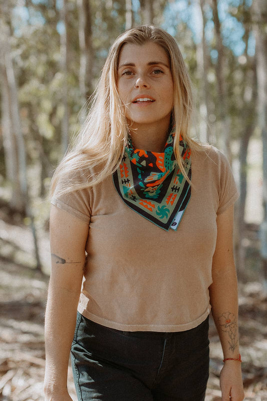 The Midnight Sun Bandana by Bandits Bandanas features original artwork by Brett Stenson and is available as a limited run design first created as an REI exclusive. Made from GOTS-certified organic cotton and produced in a Fair Trade Certified facility, this soft 21" x 21" bandana is a versatile accessory for hair, neck, and bag styling. Each purchase supports impact, with 10% of proceeds going to Alaska Wildlife Rescue (AWR).