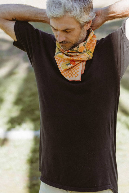 The Prickly Pollinators Bandana by Bandits Bandanas features original artwork by Zaine Vaun and celebrates the desert as a vibrant, living ecosystem. Made from GOTS-certified organic cotton and handcrafted in a Fair Trade Certified facility, this ultra-soft 21" × 21" bandana is perfect for styling in your hair, around your neck, or tied to a favorite bag. Each purchase gives back, with 10% of proceeds supporting Big Bend Conservation Alliance.