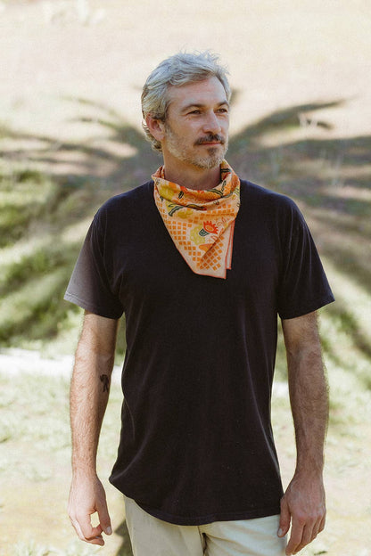 The Prickly Pollinators Bandana by Bandits Bandanas features original artwork by Zaine Vaun and celebrates the desert as a vibrant, living ecosystem. Made from GOTS-certified organic cotton and handcrafted in a Fair Trade Certified facility, this ultra-soft 21" × 21" bandana is perfect for styling in your hair, around your neck, or tied to a favorite bag. Each purchase gives back, with 10% of proceeds supporting Big Bend Conservation Alliance.