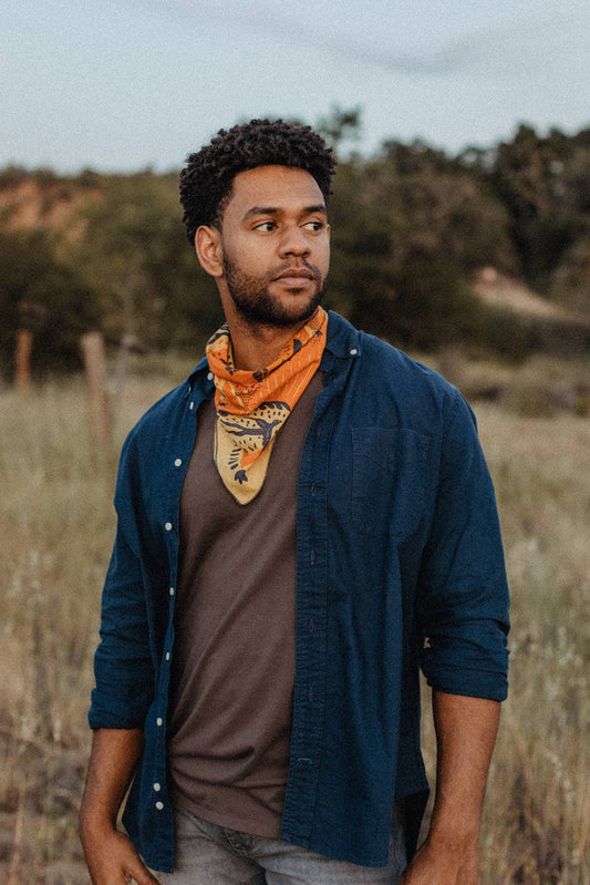 The Little Things Bandana by Bandits Bandanas features original artwork by Rachel Jung (Rayco Design), inspired by simple pleasures and big skies—coffee with a view, desert sunsets, and nights under the stars. Made from Fair Trade Certified organic cotton in a versatile 21" × 21" size, it’s easy to style at the neck, in the hair, or tied to a favorite bag. Each purchase gives back, with 10% of proceeds supporting ALS Therapy Development Institute, making this a meaningful, artist-driven accessory designed t