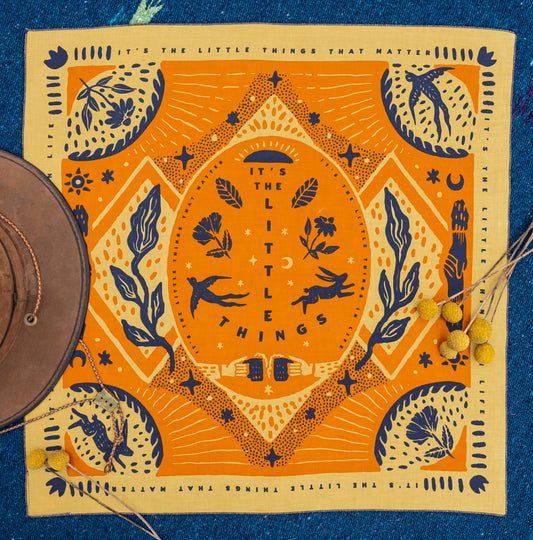 The Little Things Bandana by Bandits Bandanas features original artwork by Rachel Jung (Rayco Design), inspired by simple pleasures and big skies—coffee with a view, desert sunsets, and nights under the stars. Made from Fair Trade Certified organic cotton in a versatile 21" × 21" size, it’s easy to style at the neck, in the hair, or tied to a favorite bag. Each purchase gives back, with 10% of proceeds supporting ALS Therapy Development Institute, making this a meaningful, artist-driven accessory designed t