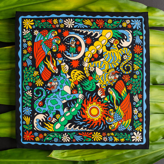 The Tropic Like It’s Hot Bandana by Bandits Bandanas features original artwork by Joshua Noom and is crafted from GOTS-certified, Fair Trade Certified organic cotton. Soft, breathable, and easy to style, this 21" × 21" bandana is perfect for everyday wear—at the neck, in the hair, or tied to a favorite bag. Each purchase gives back, with 10% of proceeds supporting American Red Cross Hurricane Relief, making it a vibrant, artist-driven accessory with meaningful impact.