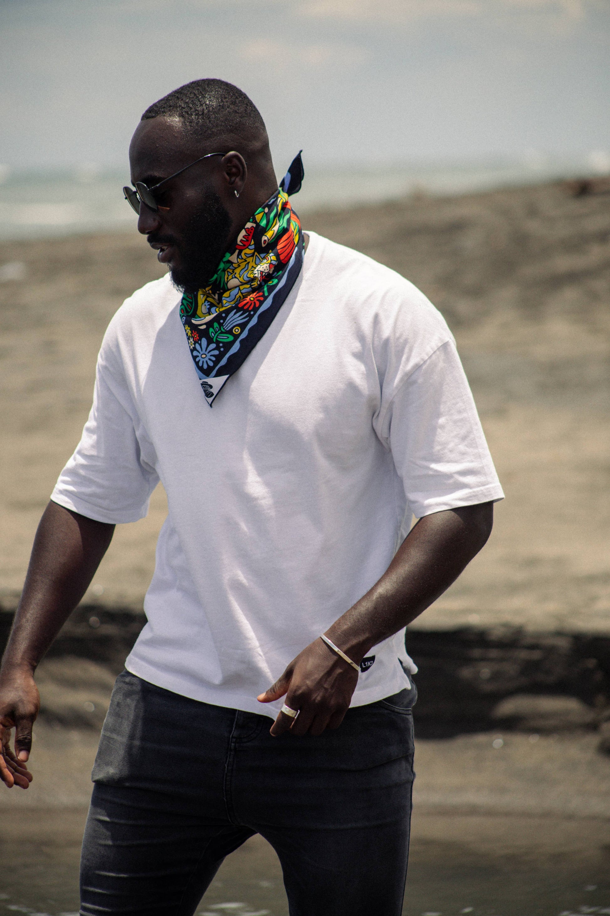 The Tropic Like It’s Hot Bandana by Bandits Bandanas features original artwork by Joshua Noom and is crafted from GOTS-certified, Fair Trade Certified organic cotton. Soft, breathable, and easy to style, this 21" × 21" bandana is perfect for everyday wear—at the neck, in the hair, or tied to a favorite bag. Each purchase gives back, with 10% of proceeds supporting American Red Cross Hurricane Relief, making it a vibrant, artist-driven accessory with meaningful impact.