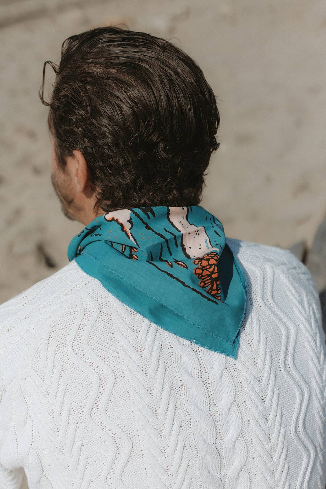 The Volcano and Sea Bandana by Bandits Bandanas features original artwork by Indonesian artist Fahrenno Asnawan. Made from Fair Trade Certified, 100% organic cotton, this soft, artist-designed bandana is perfect for styling at the neck, in the hair, or on a favorite bag. Each purchase gives back, with 10% of proceeds supporting Wahli Indonesia, making it a meaningful accessory rooted in art, ethics, and everyday wear.