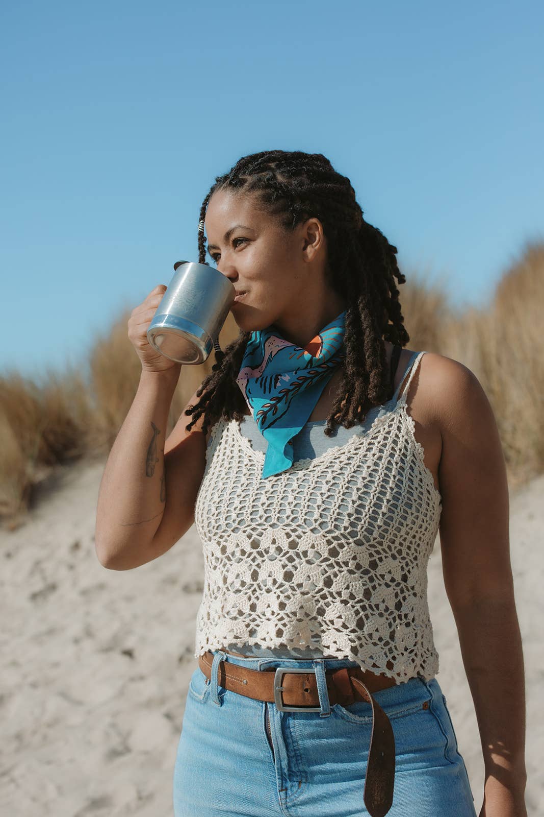 The Volcano and Sea Bandana by Bandits Bandanas features original artwork by Indonesian artist Fahrenno Asnawan. Made from Fair Trade Certified, 100% organic cotton, this soft, artist-designed bandana is perfect for styling at the neck, in the hair, or on a favorite bag. Each purchase gives back, with 10% of proceeds supporting Wahli Indonesia, making it a meaningful accessory rooted in art, ethics, and everyday wear.