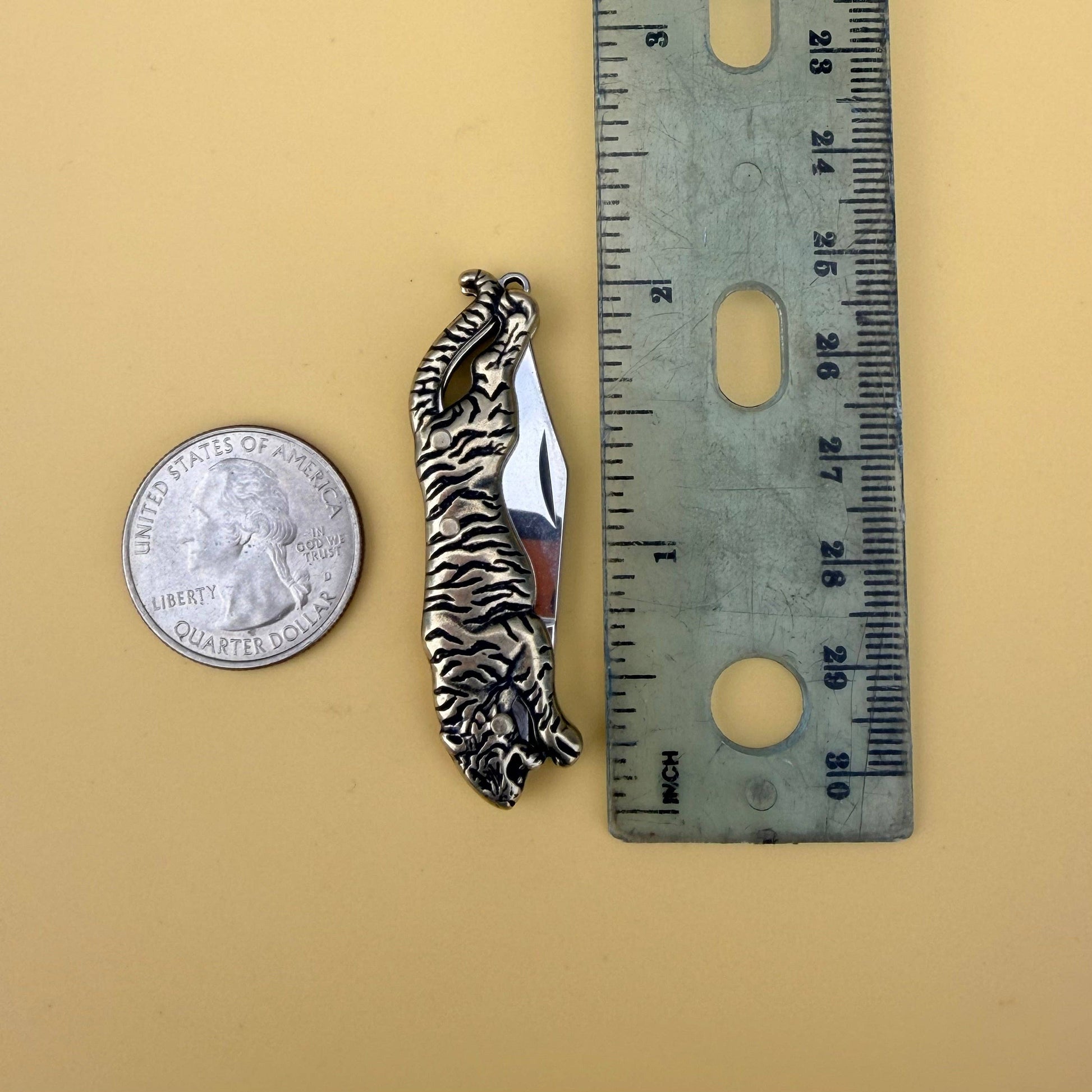 The Untamed Necklace by Fluff Hardware is a handcrafted gold-filled necklace featuring a tiger-inspired functional utility charm accented with natural turquoise nugget beads. Designed for empowered, intentional wear, this small-batch piece blends symbolic jewelry with practical design. Finished on a hypoallergenic 14k gold filled chain, it’s a striking accessory for those drawn to bold craftsmanship and purpose-driven adornment.