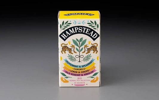 Meet your new easy ritual: the Hampstead Organic Herbal Harmonies Pack (20 teabags) is a calming assortment of organic herbal infusions, perfect for winding down, resetting between tasks, or gifting a little care. Thoughtfully sourced and organically grown, these herbal blends offer naturally caffeine-free comfort with bright, clean flavor—simple to steep, easy to love, and made for everyday sipping. Keep a box in the pantry for cozy evenings, gentle mornings, and those “I need a moment” afternoons.