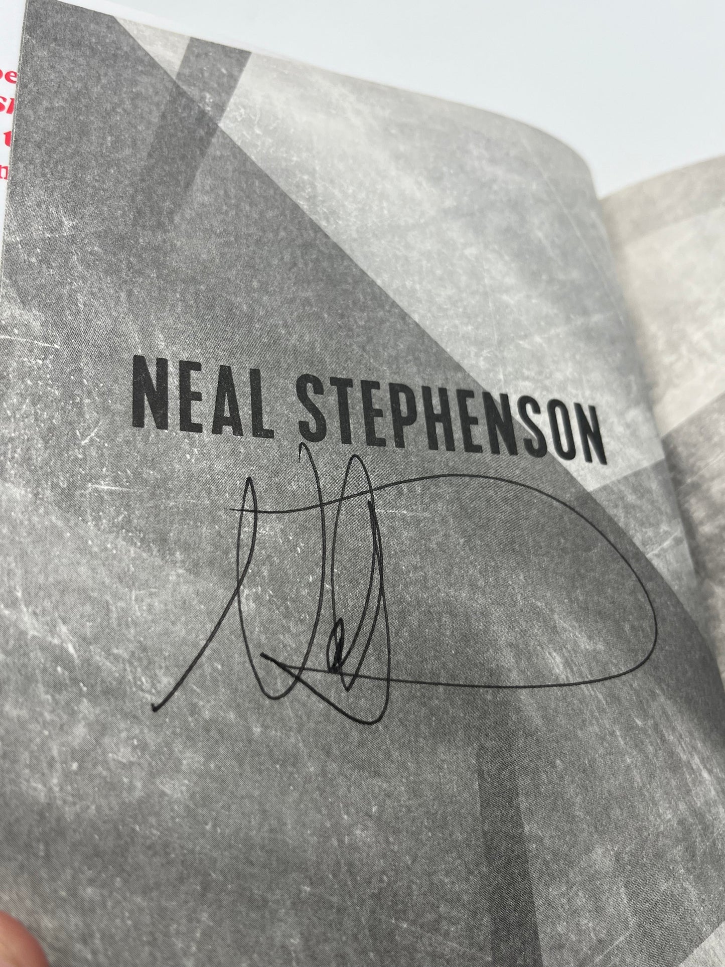 Preowned Very Good hardcover edition of Polostan by Neal Stephenson, published by Morrow, signed by the author. This signed copy shows a minor lower spine bump but is otherwise clean and well cared for. A compelling addition for fans of historical fiction, speculative storytelling, and collectors of signed science fiction and literary novels.