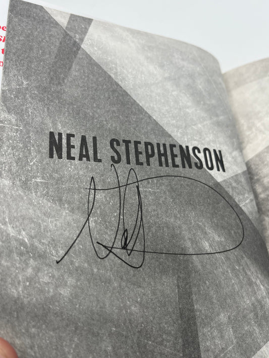 Preowned Very Good hardcover edition of Polostan by Neal Stephenson, published by Morrow, signed by the author. This signed copy shows a minor lower spine bump but is otherwise clean and well cared for. A compelling addition for fans of historical fiction, speculative storytelling, and collectors of signed science fiction and literary novels.