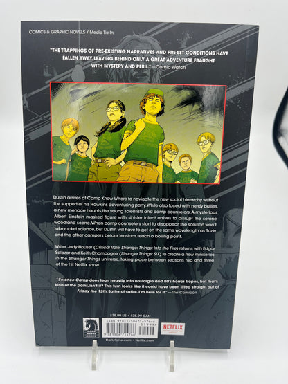 Preowned Very Good copy of Stranger Things: Science Camp, a Stranger Things graphic novel by Jody Houser and team. A fun horror-tinged mystery set in the Stranger Things world, perfect for fans of the series and readers who enjoy spooky adventures, sci-fi weirdness, and collectible tie-in comics.