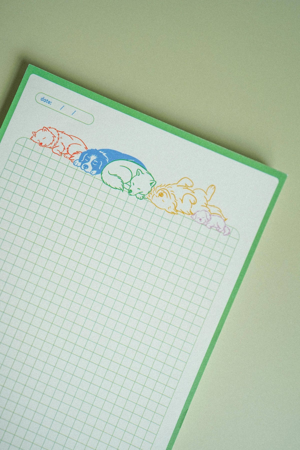Full view of the green Ruff Drafts 5x7 grid notepad