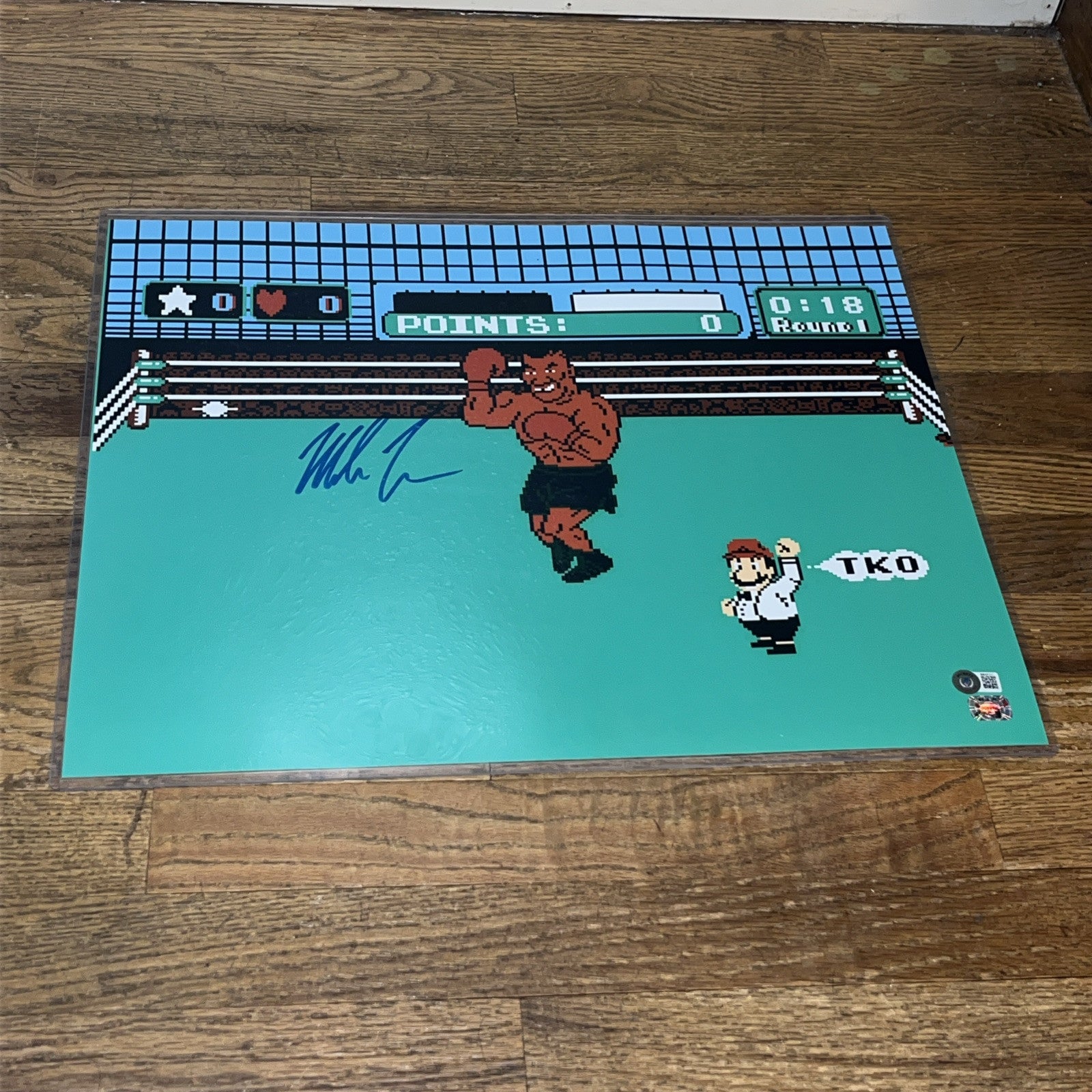 Mike Tyson Autographed 16x20 Mike Tyson’s Punch Out Beckett Authentication 