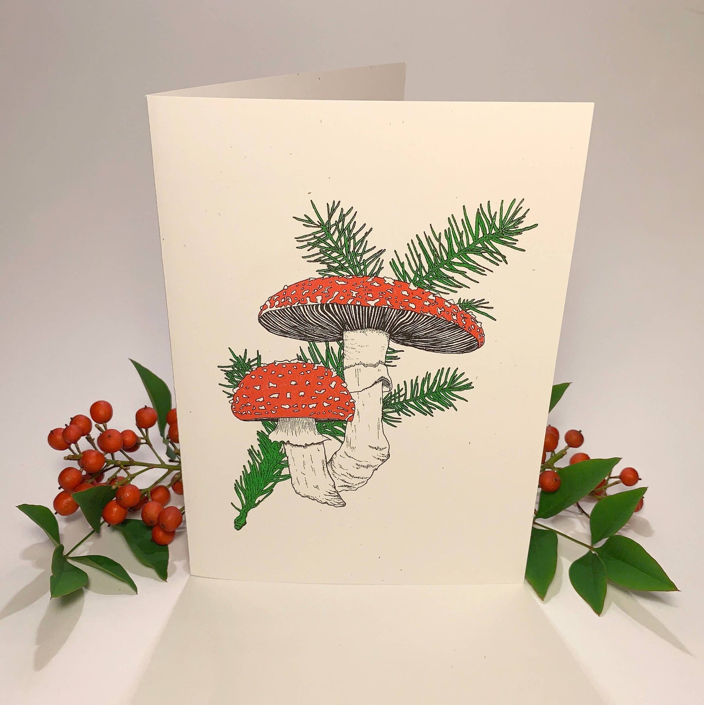 Salted Teeth, Christopher Payne art, amanita muscaria card, mushroom greeting card, risograph card, indie artist stationery, forest illustration card, Speckletone paper card, small batch risograph print, A6 greeting card, mushroom lover gift, conifer art card, artisan stationery, eco-friendly paper card, moody nature illustration