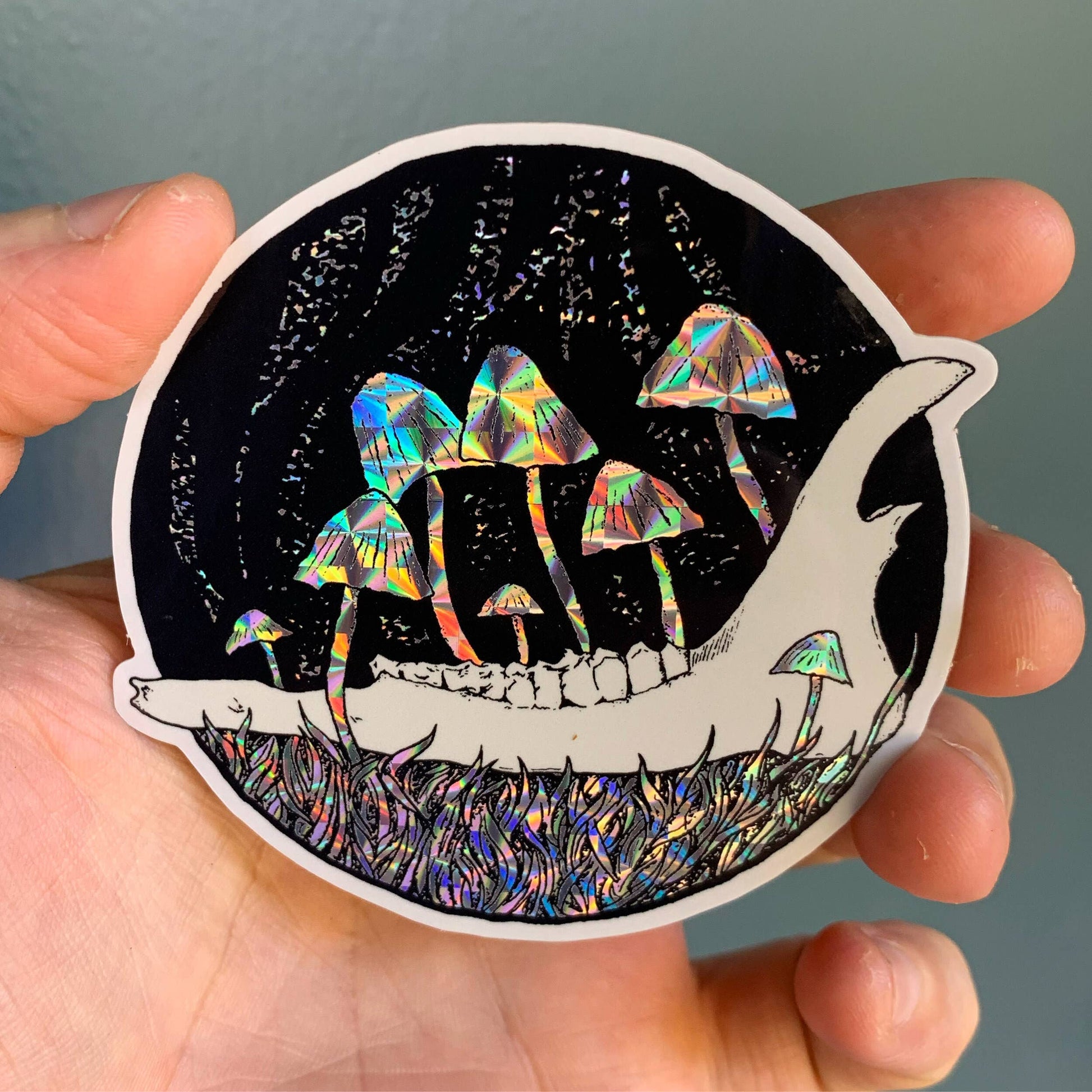 Salted Teeth sticker, Christopher Payne art, jawbone mushroom sticker, prismatic vinyl sticker, holographic sticker, psilocybin art sticker, dark nature illustration, indie artist sticker, small batch vinyl sticker, waterproof holographic sticker, gothic nature aesthetic, mushroom bone art