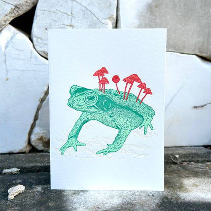 Salted Teeth, Christopher Payne art, letterpress greeting card, mushroom frog artwork, dark nature illustration, indie printmaker stationery, small batch letterpress, A6 art card, Flurry Cotton paper, Boxcar Press card, recycled kraft envelope, mushroom art card, unique greeting card, nature-inspired stationery, handmade letterpress print