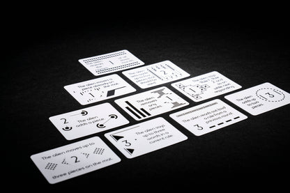Signal board game, Signal game, cooperative deduction game, communication game, logic puzzle board game, cooperative logic game, alien communication board game, hidden rules deduction game, pattern deduction game, black and white pieces game, cooperative puzzle game for adults, quick cooperative game 15 minutes, 2 player cooperative game, party size cooperative game 2 or more players, game night logic challenge, teamwork deduction board game, family logic board game age 10+, unique indie tabletop game, sci 