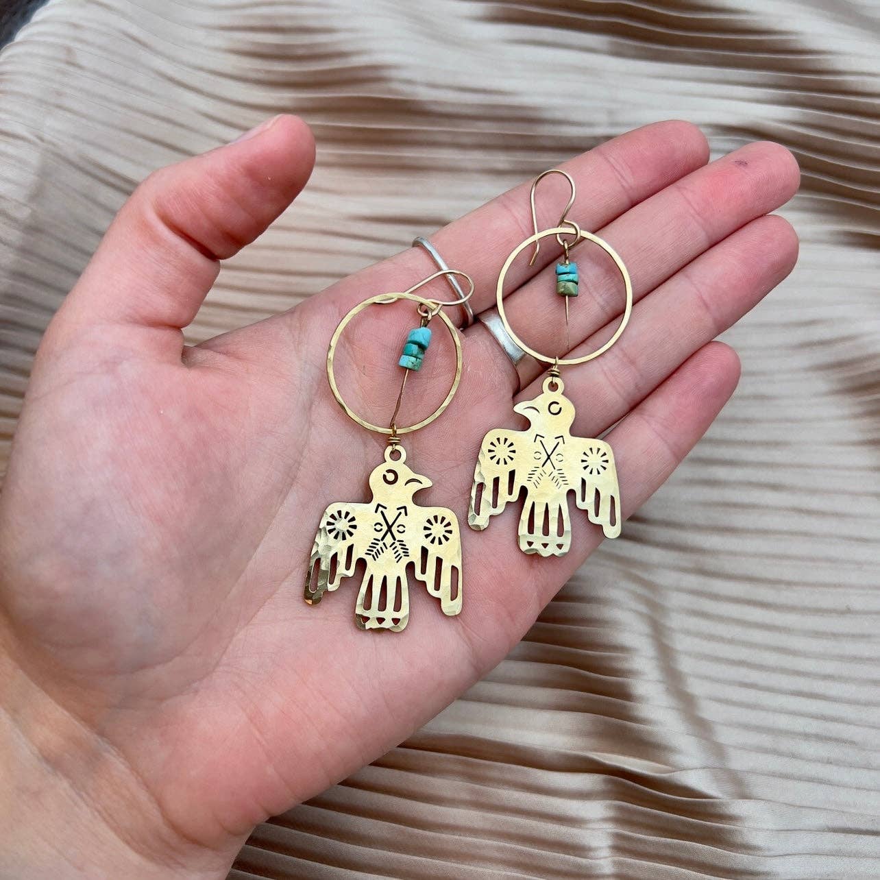 skye earrings bird and turquoise, silver bird hoop earrings, western inspired jewelry, turquoise heishi earrings, sterling silver bird earrings, nature travel earrings, bird earrings with turquoise, hypoallergenic silver earrings, wings over wild places jewelry, flight inspired earrings, handcrafted silver hoop earrings, boho bird earrings, turquoise and silver statement earrings, outdoor adventure jewelry, heishi bead bird earrings