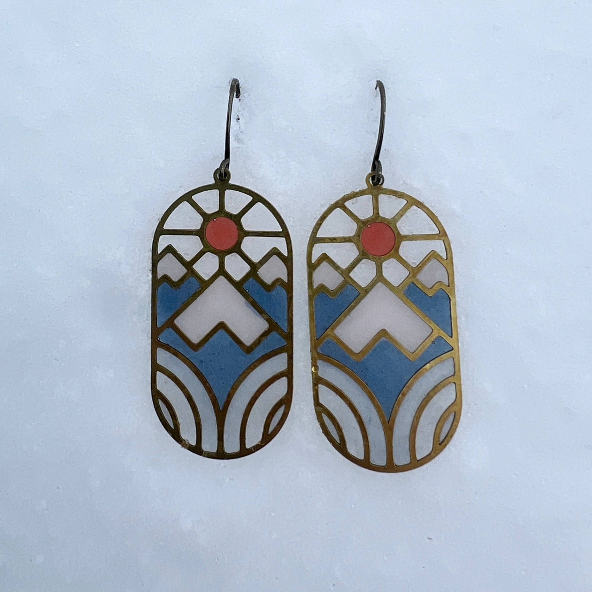 solstice earrings, stained glass resin earrings, brass nature earrings, celestial earrings, handmade dangle earrings, lightweight artisan jewelry, modern resin earrings, nature-inspired jewelry, sun and moon earrings, boho style accessories, colorful resin earrings, everyday dangle earrings, brass statement earrings, gift for nature lovers, handcrafted jewelry for women, unique solstice earrings, resin brass jewelry, Rogue & Rye earrings, artistic handmade earrings, seasonal jewelry gift