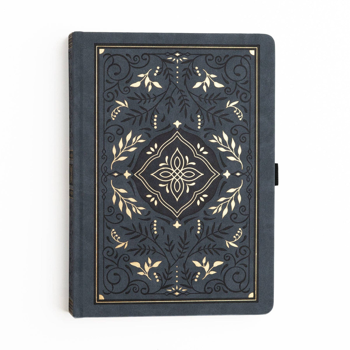 Close-up of ornate botanical artwork on Storybook Navy notebook cover