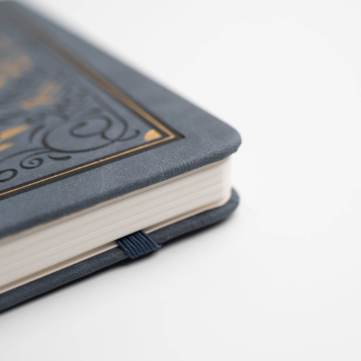 Close-up of Storybook Navy notebook corner and thick white pages