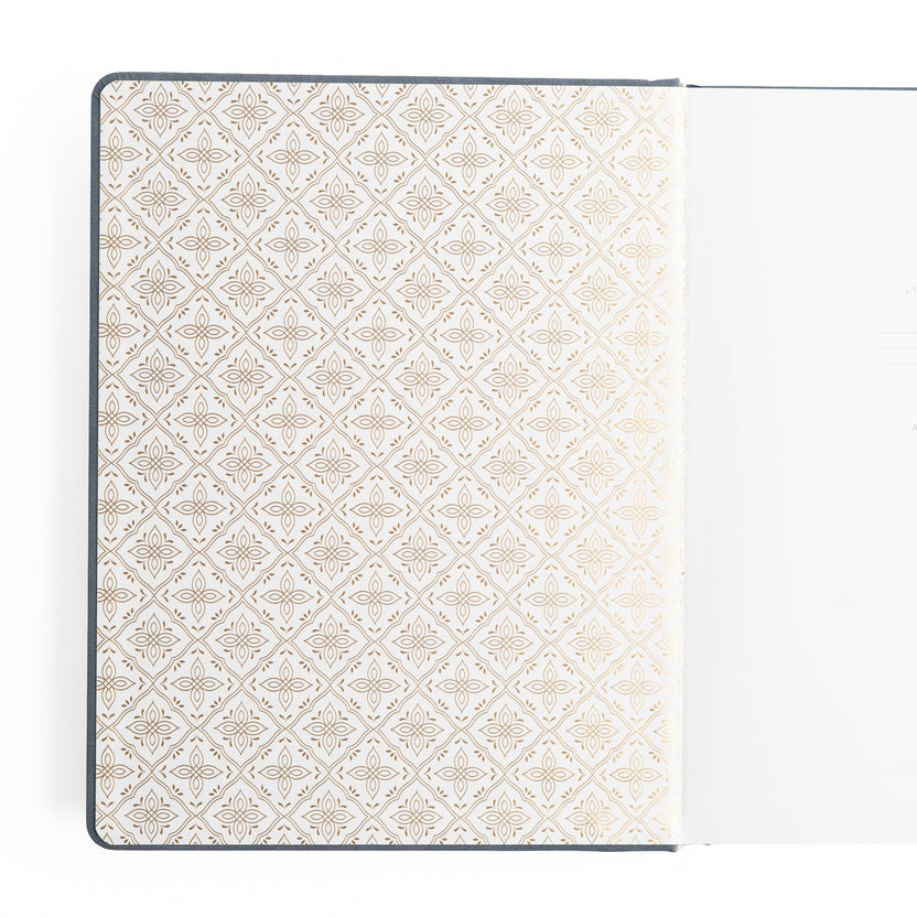 Decorative patterned endpaper inside Storybook Navy notebook