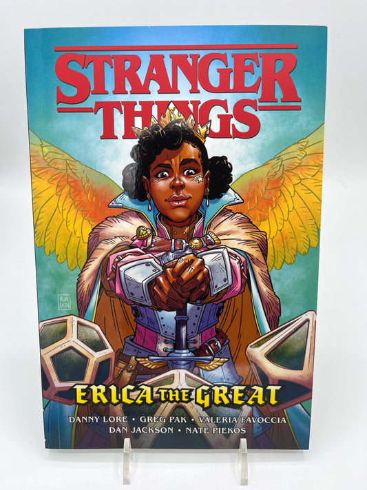 Cover of Stranger Things: Erica the Great featuring Erica Sinclair dressed in fantasy armor with wings, holding a sword beneath the Stranger Things logo.