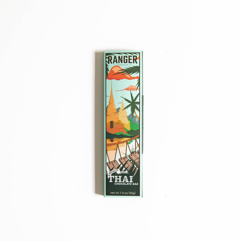 thai chocolate bar, adventure series chocolate, coconut milk chocolate, galangal chocolate bar, white pepper chocolate, crunchy rice chocolate, thai inspired sweets, artisan chocolate Portland Oregon, small batch chocolate, Ranger Chocolate Co., organic cacao chocolate bar, unique flavor chocolate, gourmet chocolate gifts, bean to bar adventure chocolate, Rogue and Rye artisan foods, global flavors chocolate, chocolate for foodies, craft chocolate with coconut milk, fair trade cacao chocolate, specialty cho