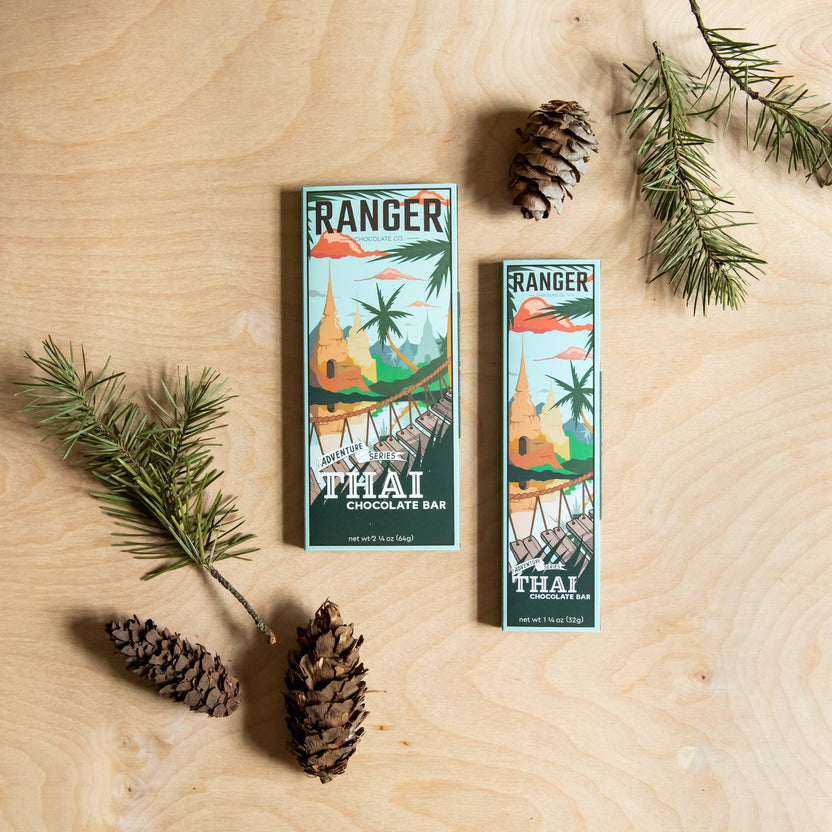 thai chocolate bar, adventure series chocolate, coconut milk chocolate, galangal chocolate bar, white pepper chocolate, crunchy rice chocolate, thai inspired sweets, artisan chocolate Portland Oregon, small batch chocolate, Ranger Chocolate Co., organic cacao chocolate bar, unique flavor chocolate, gourmet chocolate gifts, bean to bar adventure chocolate, Rogue and Rye artisan foods, global flavors chocolate, chocolate for foodies, craft chocolate with coconut milk, fair trade cacao chocolate, specialty cho