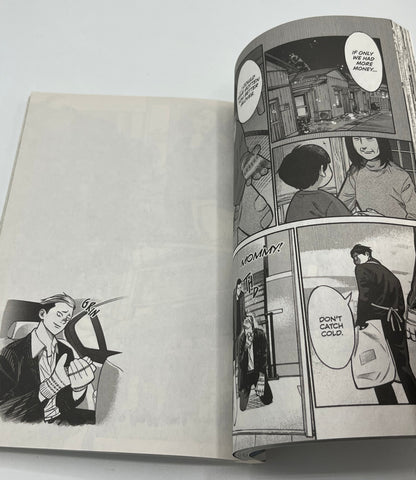Interior manga pages from The Way of the Househusband Volume 1 featuring Tatsu in a black-and-white slice-of-life scene with expressive artwork and dialogue panels.