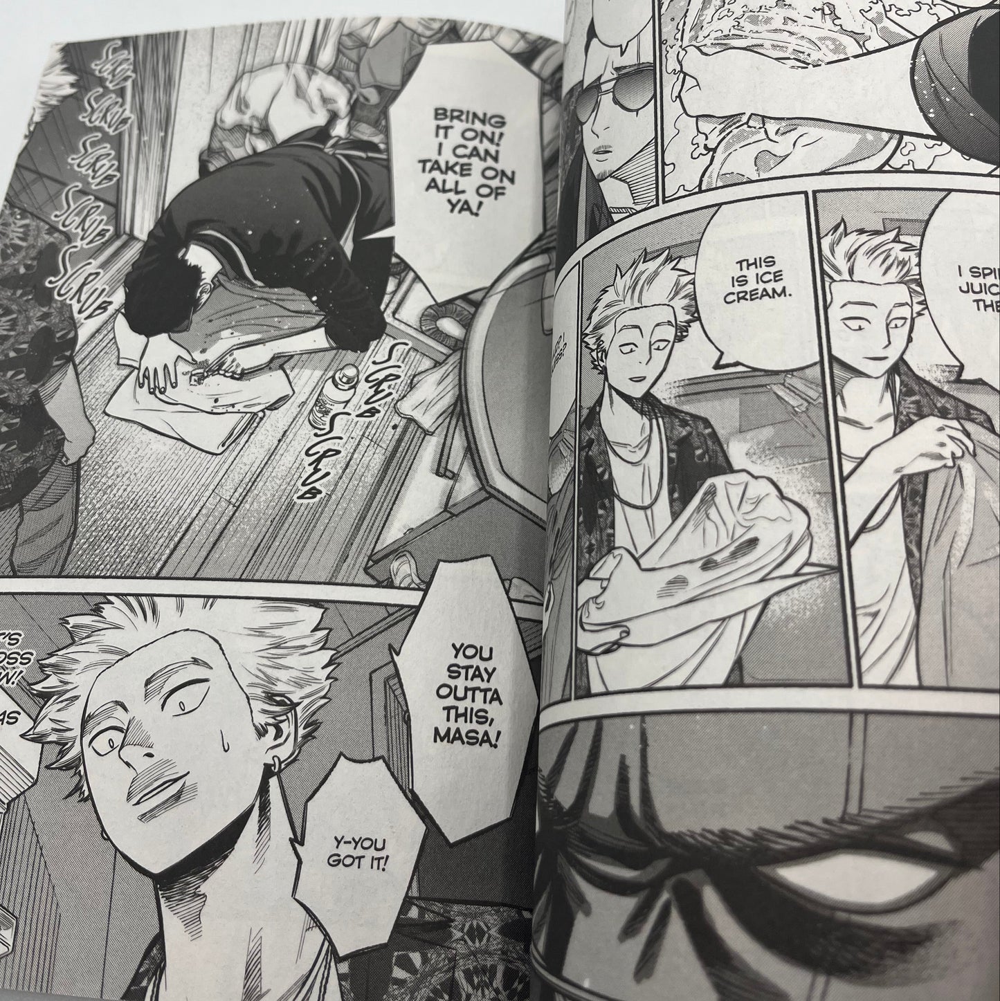 Interior manga pages from The Way of the Househusband Volume 2 featuring Tatsu in a comedic scene with expressive character artwork and dialogue panels.