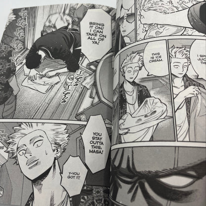 Interior manga pages from The Way of the Househusband Volume 2 featuring Tatsu in a comedic scene with expressive character artwork and dialogue panels.