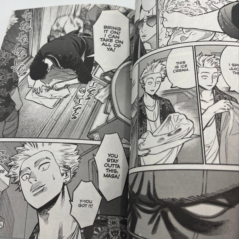 Interior manga pages from The Way of the Househusband Volume 2 featuring Tatsu in a comedic scene with expressive character artwork and dialogue panels.
