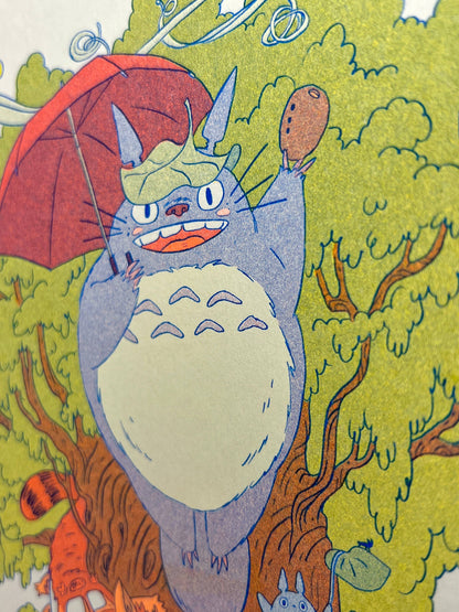 totoro risograph print, forest spirit art print, Natalie Andrewson riso print, blue yellow fluorescent orange riso, Studio Ghibli inspired artwork, whimsical forest spirits illustration, Totoro fan art print, indie printmaker risograph, woodland guardian art, collectible riso print, Rogue & Rye artist collection.