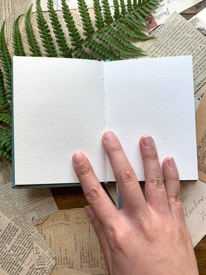 passport watercolor sketchbook, RPG sketch journal, 300gsm watercolor paper notebook, pocket RPG notebook, miniature watercolor sketchbook, Antiquarian RPG journal, on-the-go watercolor journal, travel-sized art notebook, RPG character sketchbook, DnD map sketchbook