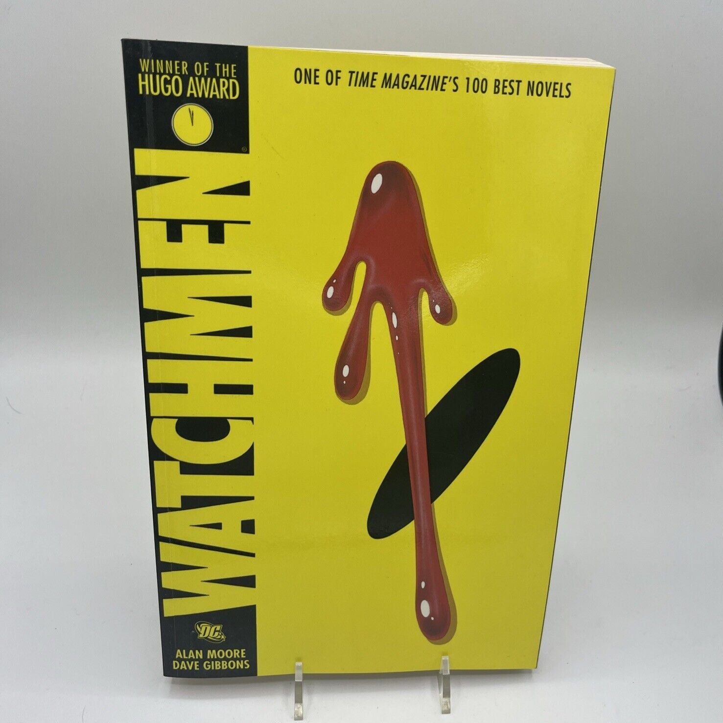 Front cover of the Watchmen trade paperback graphic novel by Alan Moore and Dave Gibbons published by DC Comics.